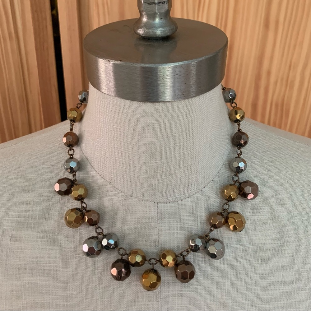 Silver, gold and bronze bauble necklace